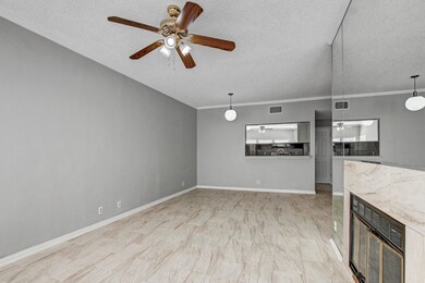 Unfurnished living room with a textured ceiling, 