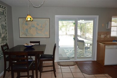 FROM LIVING ROOM - GREAT VIEW OF POOL AND PATIO AR