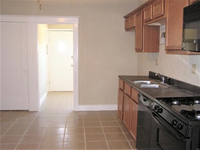 Kitchen - There is a now a refrigerator which is l