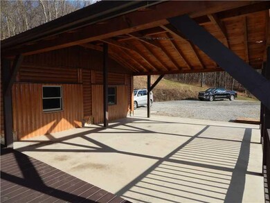 Other. Attached pavilion/covered parking area