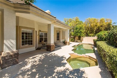 Covered patio lap heated pool and spa