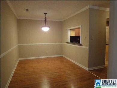 Dining room with kitchen pass through.