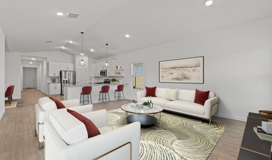 Open concept living spaces with vaulted ceiling