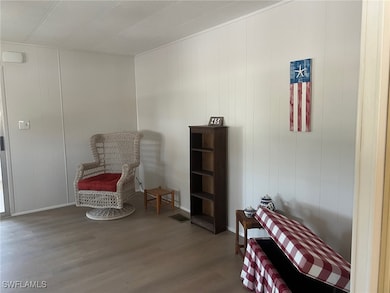Sitting room with wood finished floors