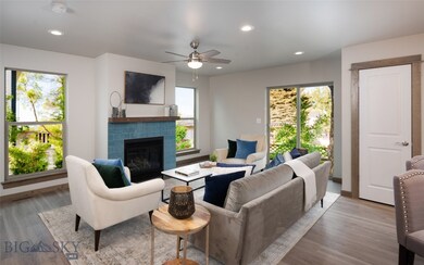 Living room with light hardwood / wood-style floor
