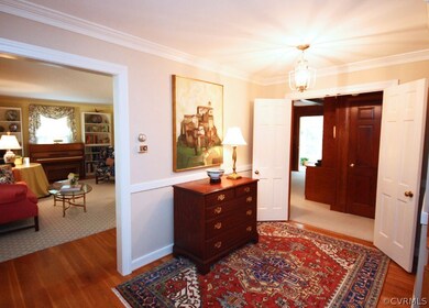 The foyer in this lovely home is spacious and welcoming.