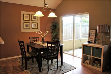 Dining Room with large bright sliders leading to s