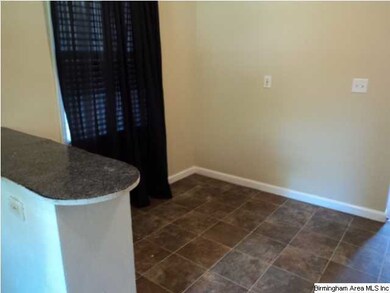Breakfast bar/ eat in kitchen makes this a useful 