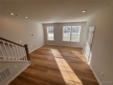 Unfurnished room with light hardwood / wood-style