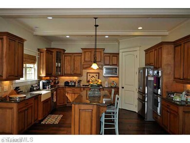 Kitchen. This well appointed kitchen offers granite counter tops and a big fire clay farm sink.