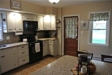 Another view of the kitchen looking toward the rea