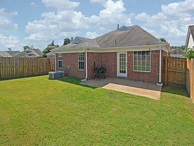 spacious fenced backyard