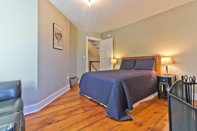 Guest bedroom with original...