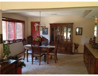 Dining Room. Spacious Formal dining room with bay window and oak built ins.