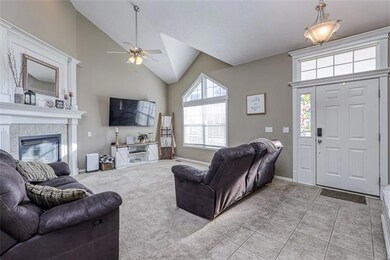 vaulted great room with gas fireplace