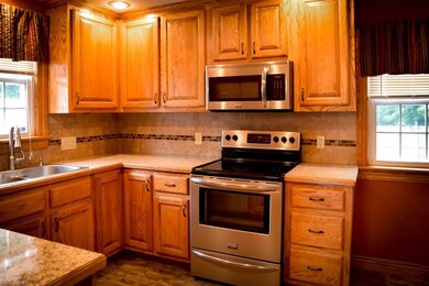Stainless steel appliances in the kitchen.