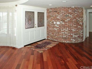 Double-door entry with expansive foyer.