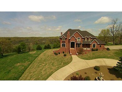Aerial View. Home sits on 1.54 easy to maintain acres.
