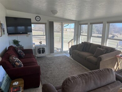 Sunroom in main house overlooking the beautiful fa