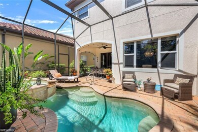 View of pool featuring a patio, ceiling fan, a lan