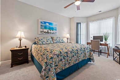 Bedroom with carpet flooring and ceiling fan