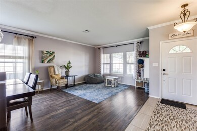Entryway featuring ornamental molding, healthy am
