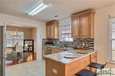 Steps to formal dining room. Sit at the counter fo