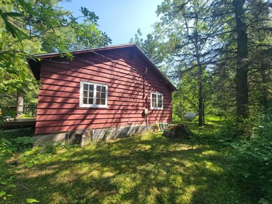 View of home's exterior with a yard
