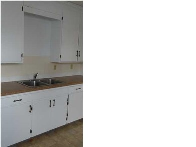 View of the bright kitchen.