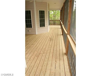 Exterior Back - The rear screened in porch is spac