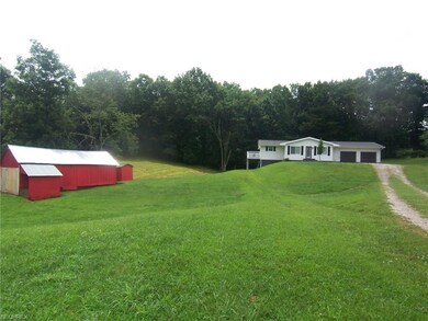 view of barn and house