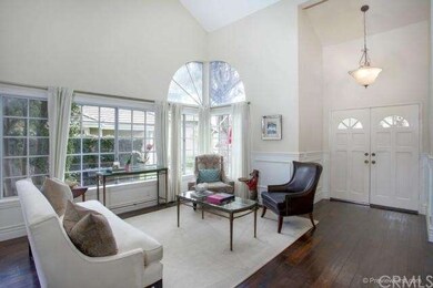 Double doors at the front and wide plank wood floo