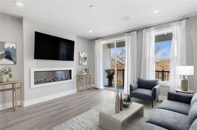 Virtual Staged Living room featuring light wood-ty
