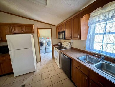 472 Big Sandy Rd, Left Hand, WV 25251 - photo 2