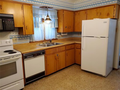 Kitchen with original wood cabinets