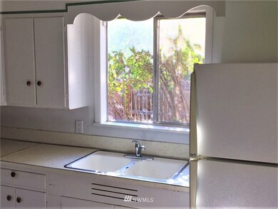 Dual sink in the kitchen makes washing dishes easy.