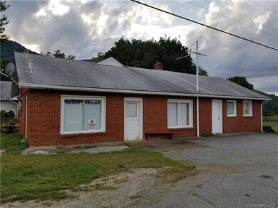 Front of shop on main rd. House is behind here