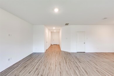 Unfurnished room with light wood-type flooring an