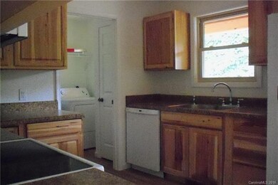 Shows Laundry Room Off Kitchen