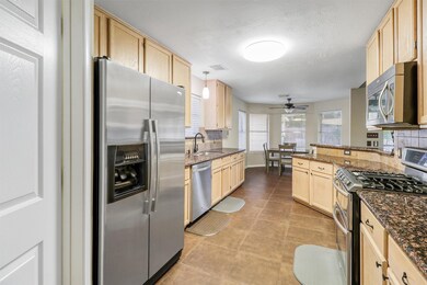 The spacious kitchen is truly a chef's delight, th