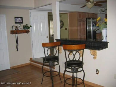 Breakfast bar open to the family room