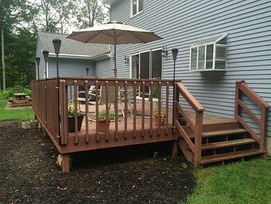Exterior Front. Deck #1 - sliders from kitchen to