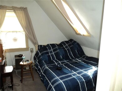 2nd upstairs bedroom with sky light