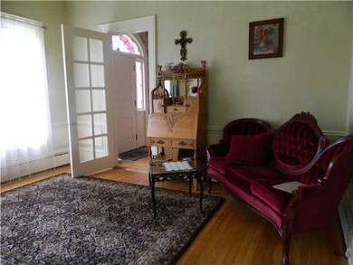 Studio/Study/Office. The front parlor.