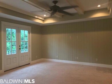 Trey Ceiling and painted exposed beams.