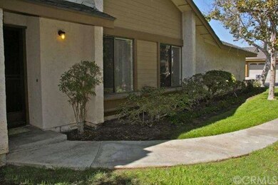 Protected entry with a screen door, and bedrooms l