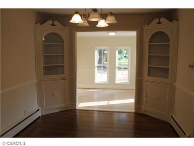 Other - Sunroom beyond the Formal Dining Room.  Us