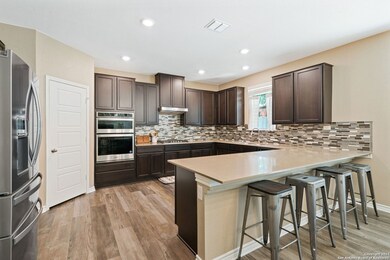 11233 Hill Top Bend, Helotes, TX 78023 - photo 6