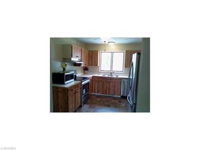 View of the kitchen with all new stainless steel appliances!