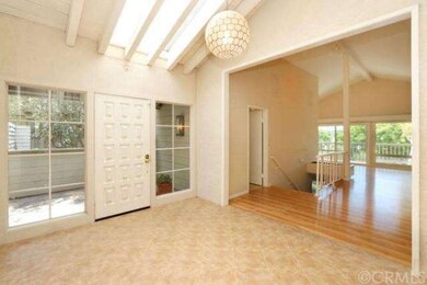 Bright and Spacious Entry Foyer Transitions into M